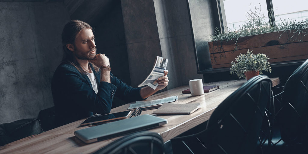 Man trying to research a company before an interview.